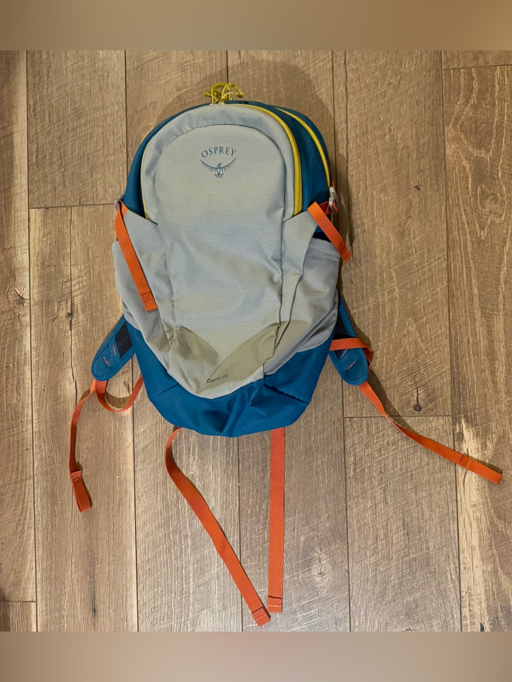 OSPREY Blue Backpack with Light Gray Front and Orange Straps
